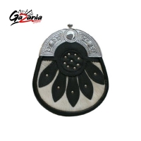    SPORRAN is black leather with a Celtic cantle, a white cowhide base on the front over layed